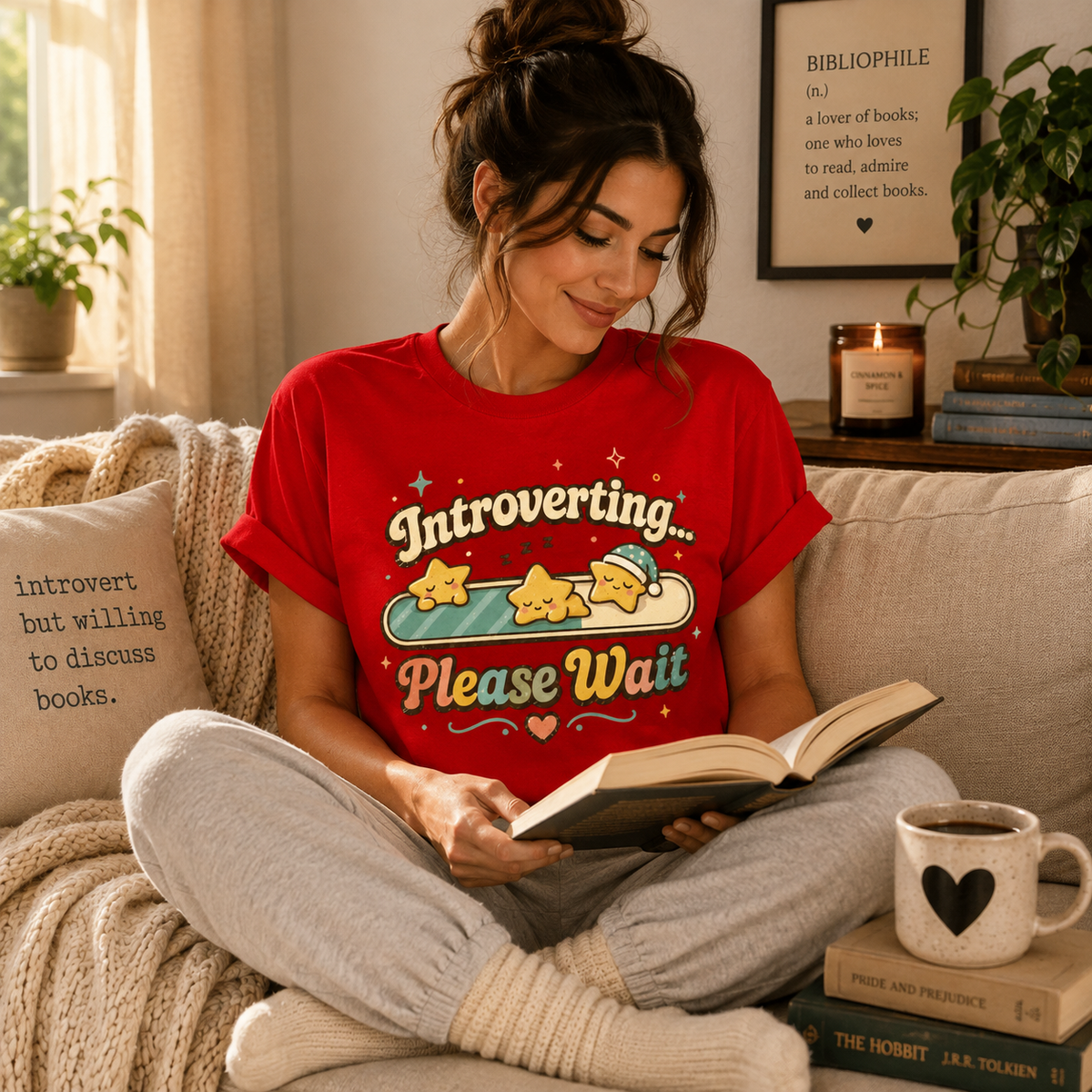 A woman wearing a red Introverting... Please Wait cute kawaii graphic t-shirt.