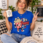 A woman wearing a true royal It's Poppin' retro food graphic t-shirt.