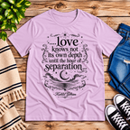 Love Knows Not book quote graphic t-shirt cozy flat lay in lilac.