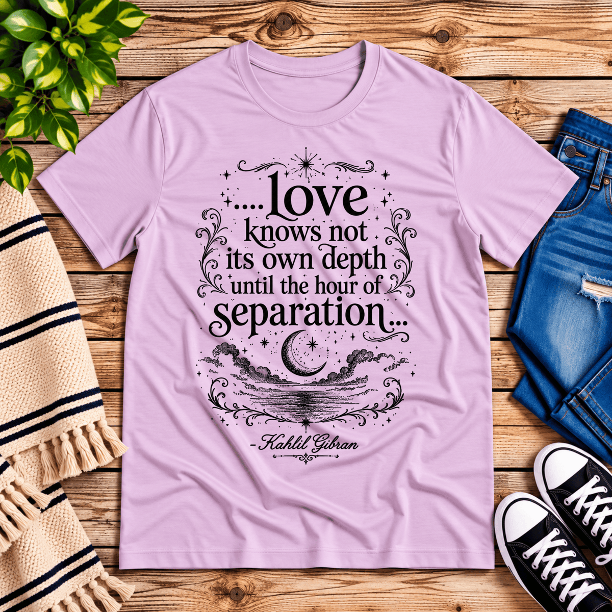 Love Knows Not book quote graphic t-shirt cozy flat lay in lilac.