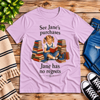 See Jane's Purchases vintage book graphic t-shirt cozy flat lay in lilac.