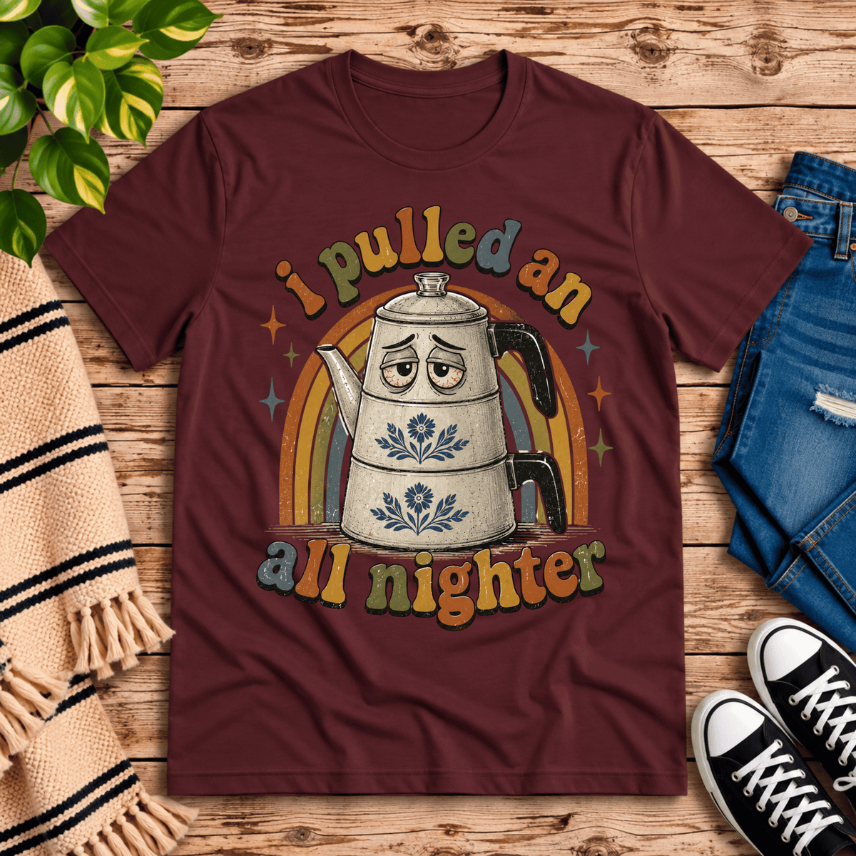 All Nighter cute coffee graphic t-shirt cozy flat lay in maroon.