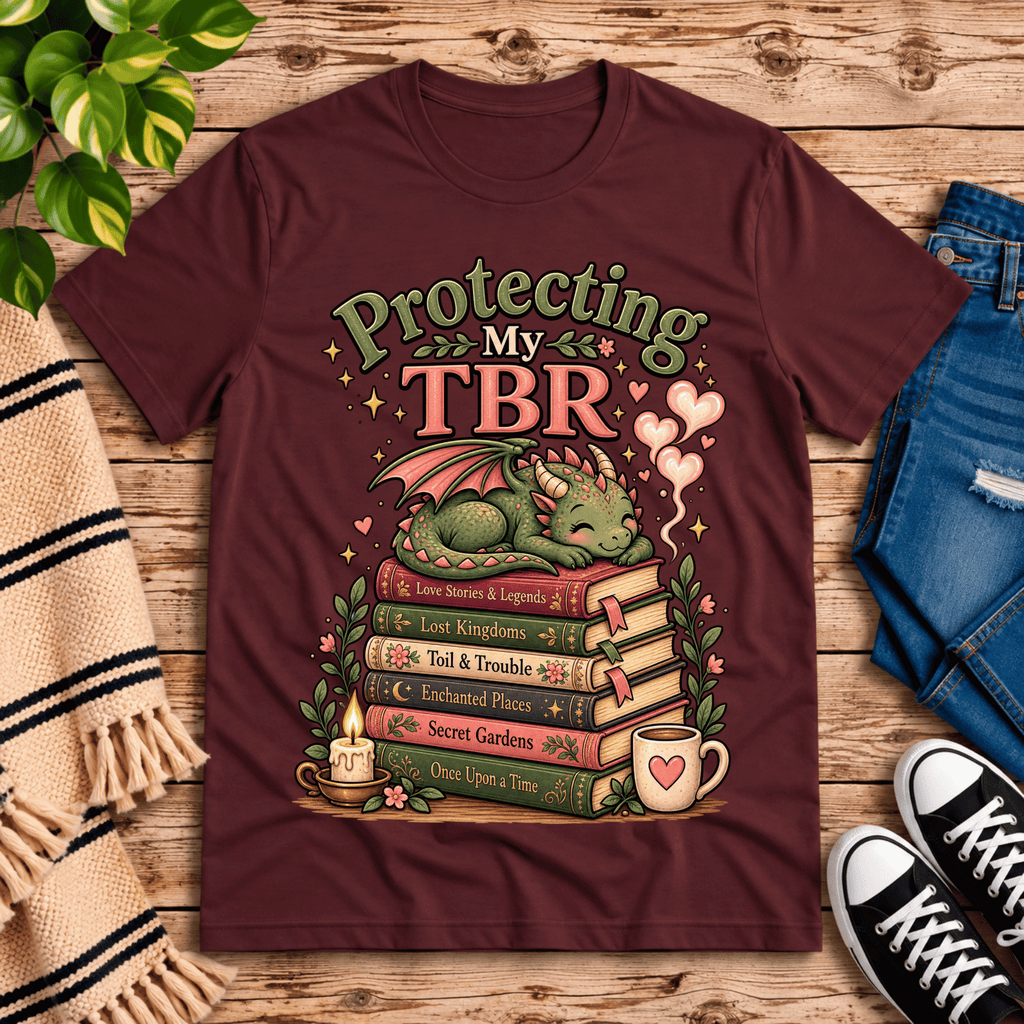 Protecting My TBR cute book graphic t-shirt cozy flat lay in maroon.