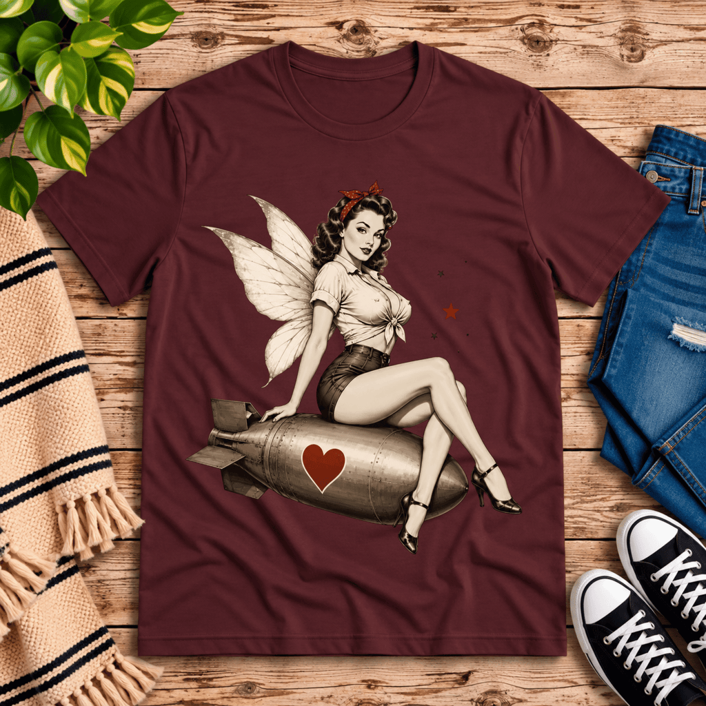 Love Bomb vintage pinup graphic t-shirt cozy flat lay in maroon.