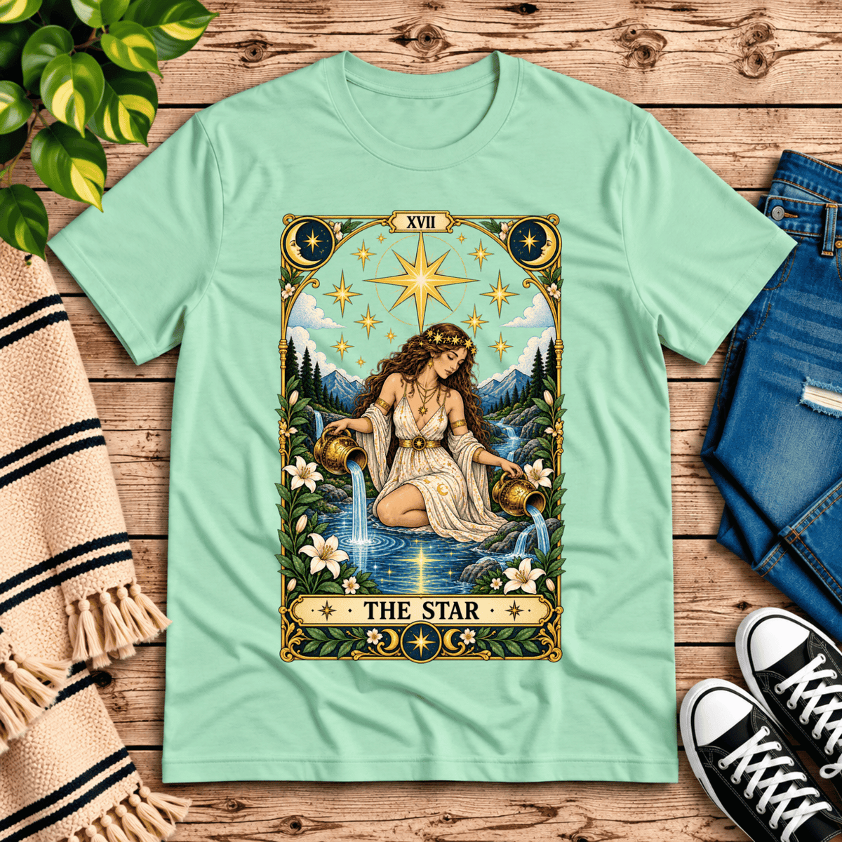 The Star tarot card graphic t-shirt cozy flat lay in mint.