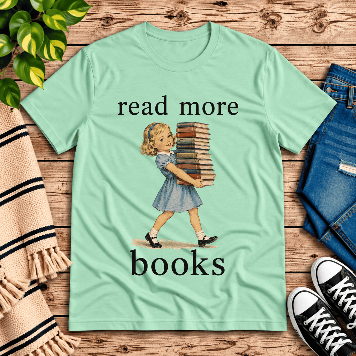 Read More vintage book graphic t-shirt cozy flat lay in mint.