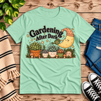 Gardening After Dark nature lover graphic t-shirt cozy flat lay in mint.