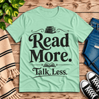 Talk Less funny book graphic t-shirt cozy flat lay in mint.