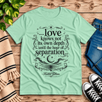 Love Knows Not book quote graphic t-shirt cozy flat lay in mint.