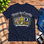 Trust the Cards mystical tarot graphic t-shirt cozy flat lay in navy.