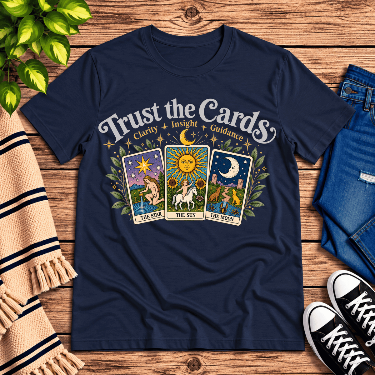 Trust the Cards mystical tarot graphic t-shirt cozy flat lay in navy.