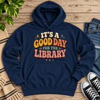 It's A Good Day cute book graphic hoodie cozy flat lay in navy.