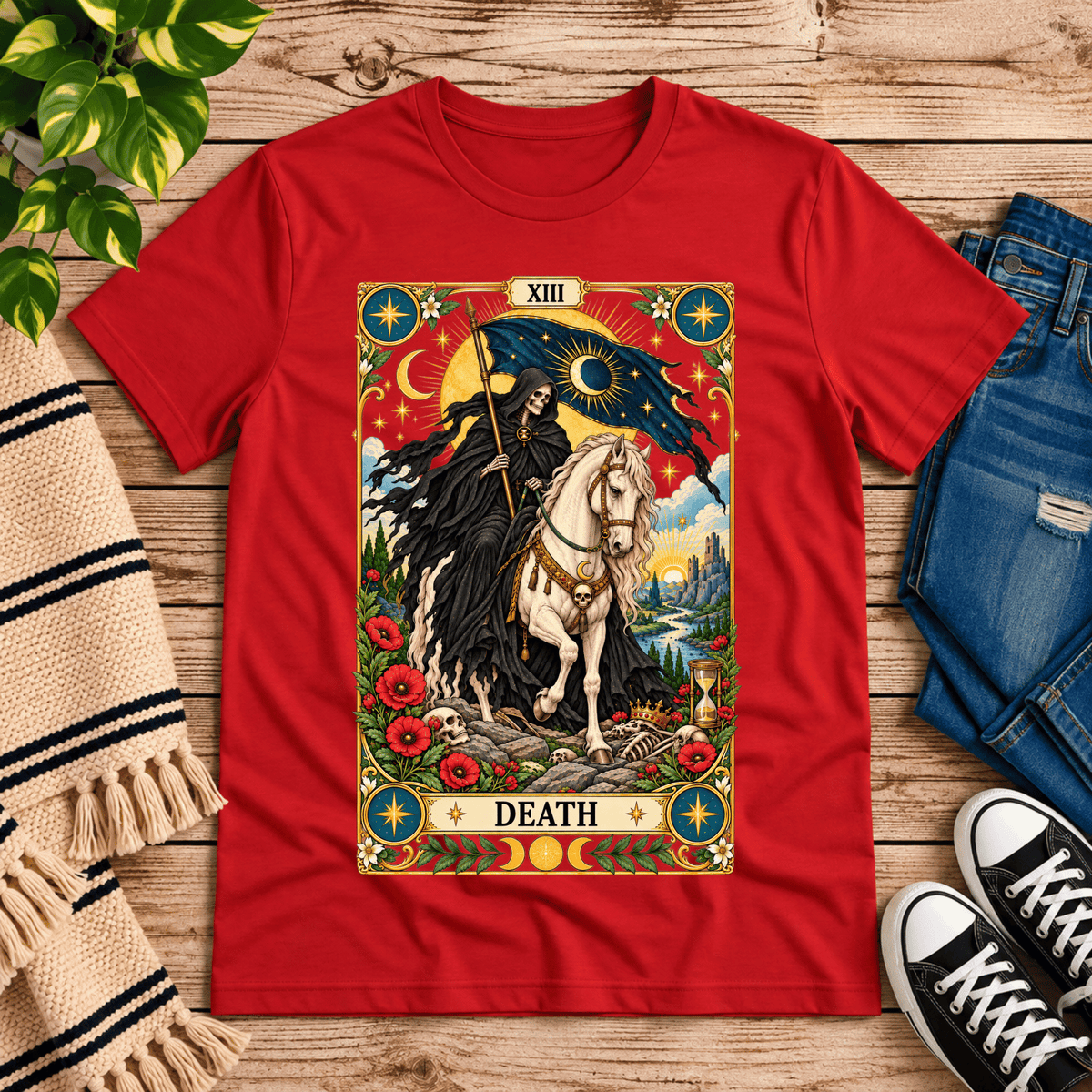 Death tarot card graphic t-shirt cozy flat lay in red.