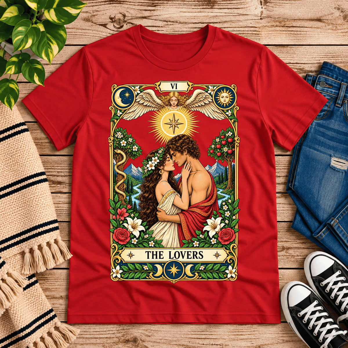 The Lovers tarot card graphic t-shirt cozy flat lay in red.