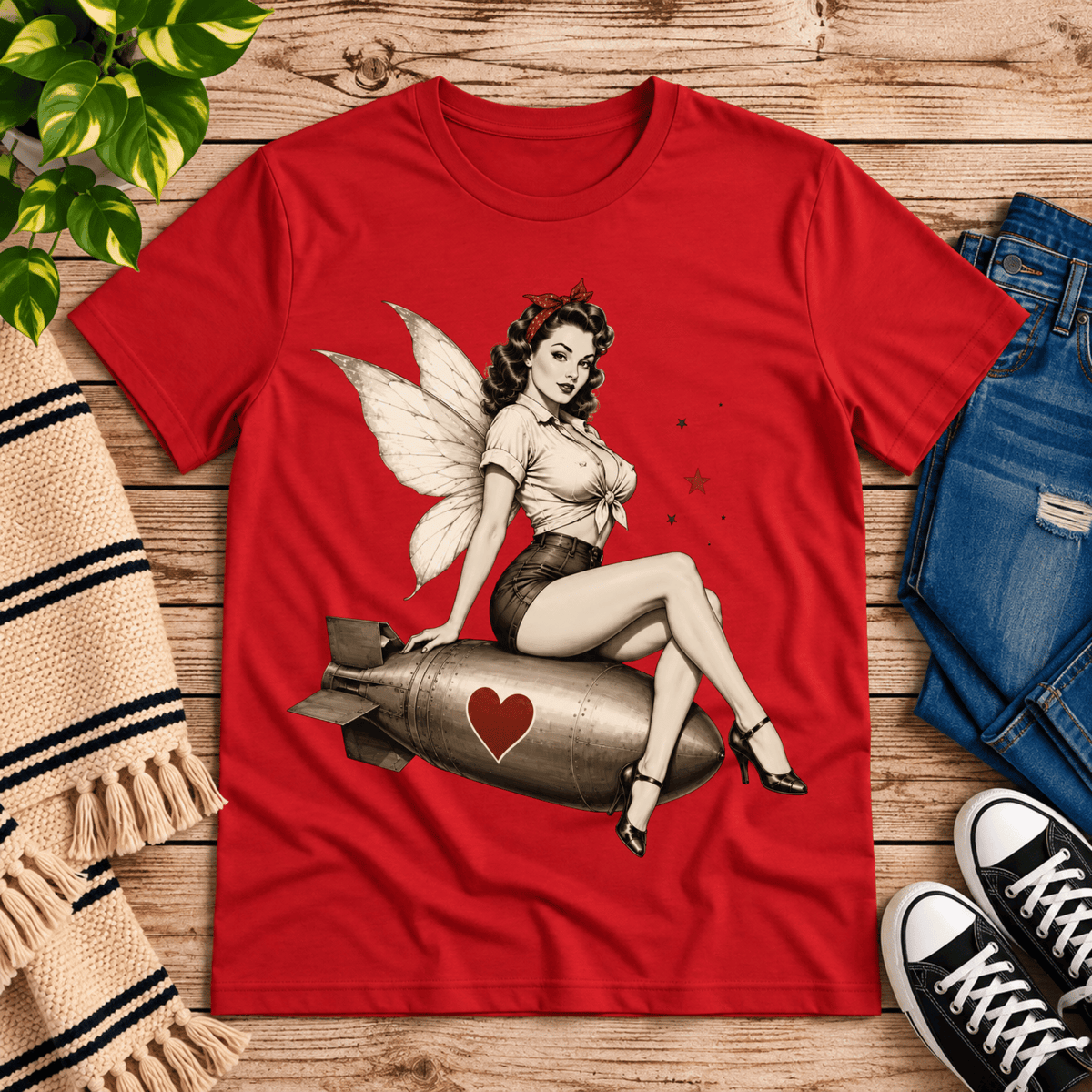 Love Bomb vintage pinup graphic t-shirt cozy flat lay in red.