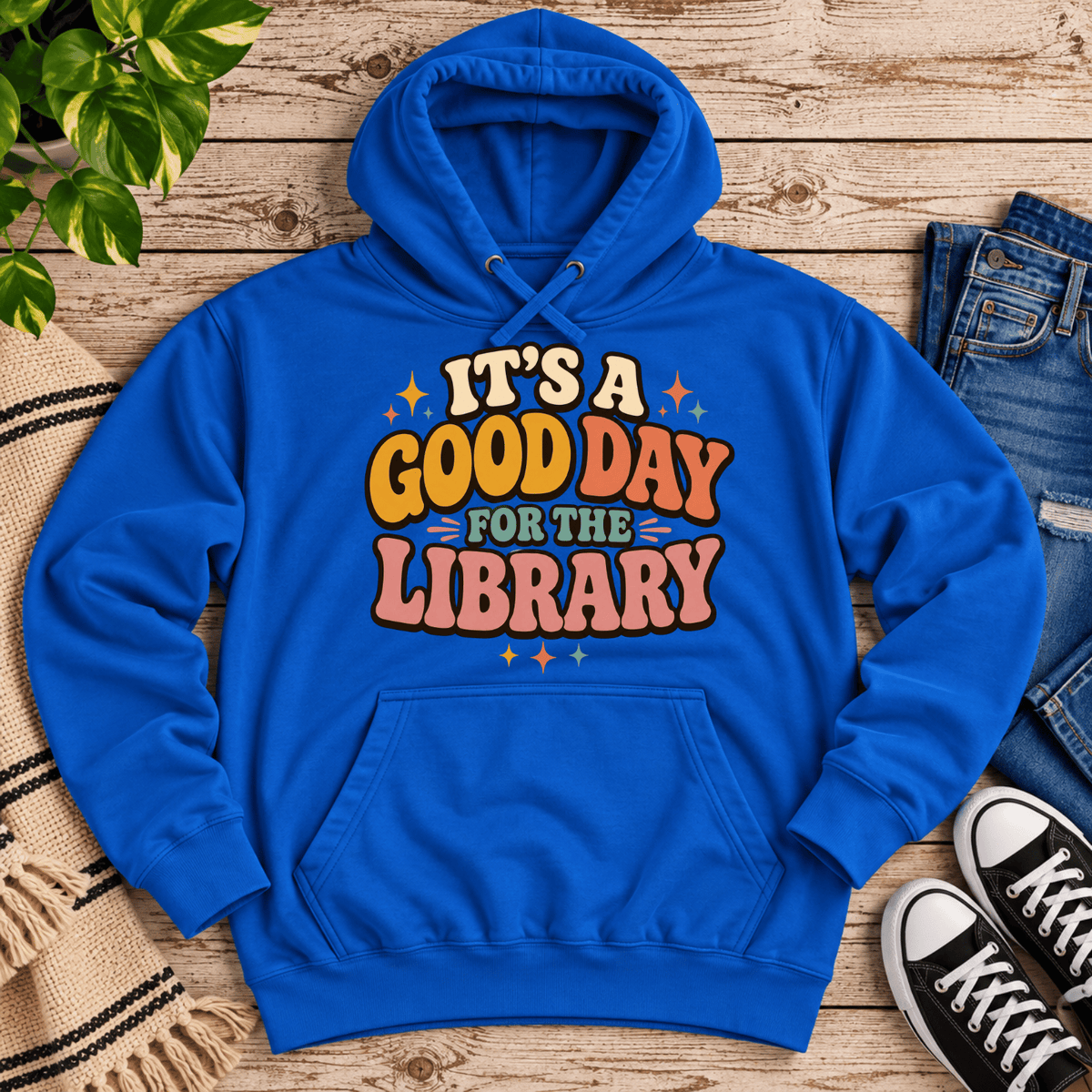 It's A Good Day cute book graphic hoodie cozy flat lay in royal blue.