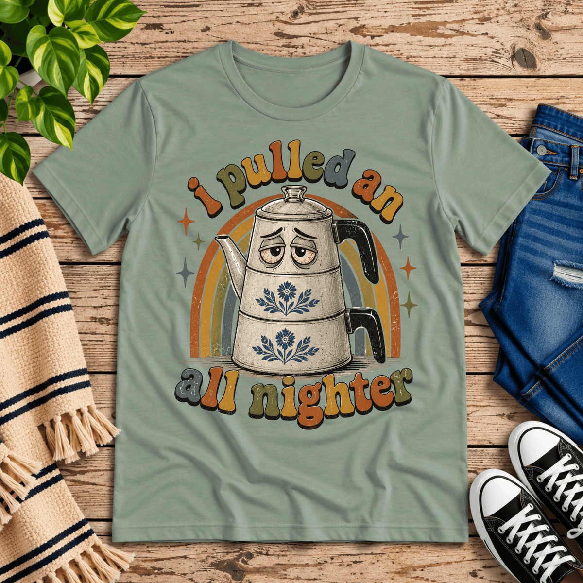 All Nighter cute coffee graphic t-shirt cozy flat lay in sage.