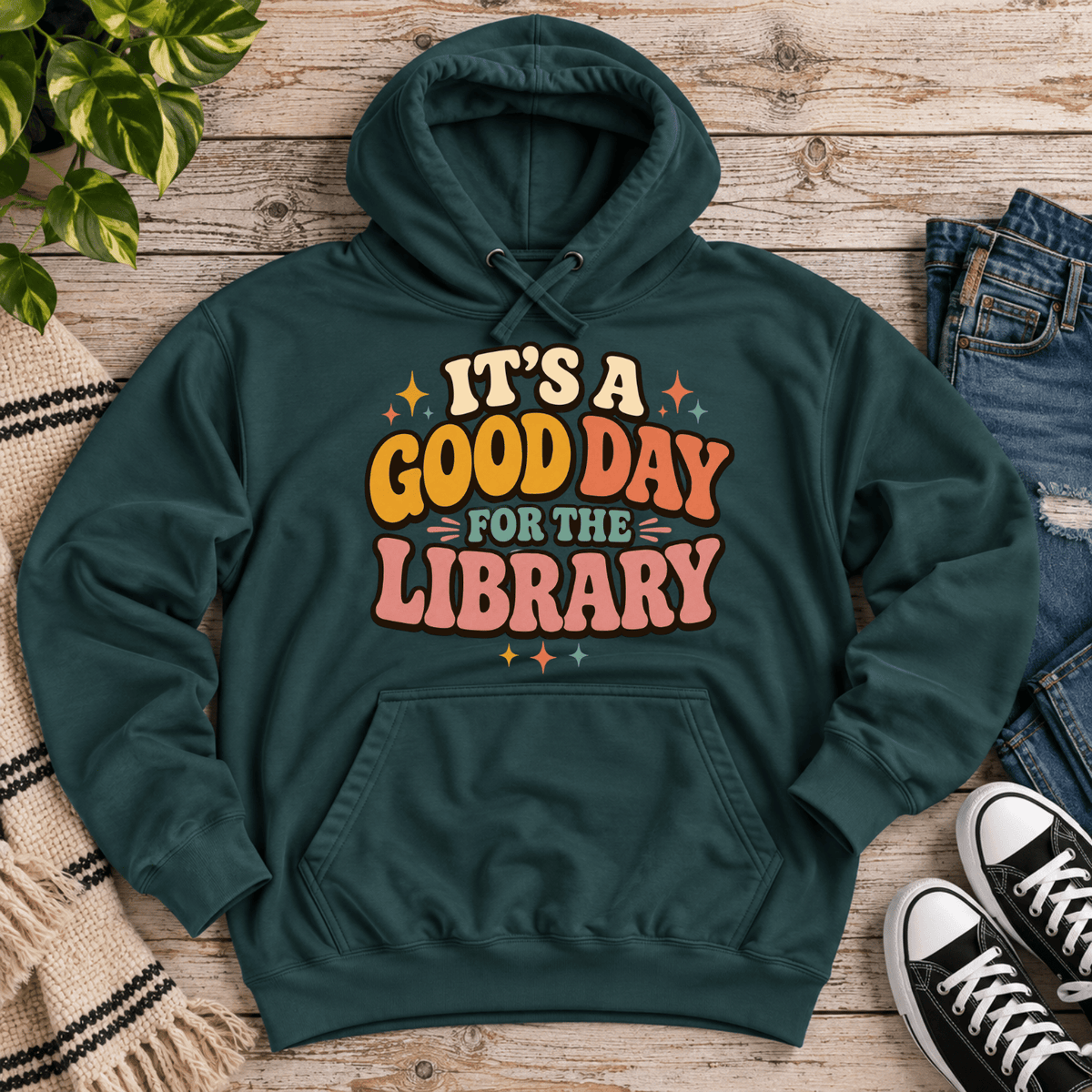 It's A Good Day cute book graphic hoodie cozy flat lay in sports green.
