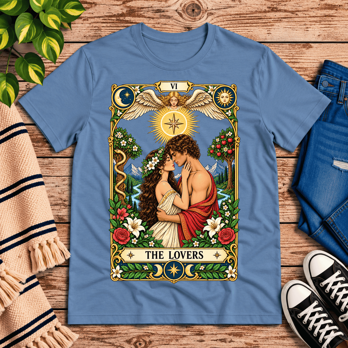 The Lovers tarot card graphic t-shirt cozy flat lay in steel blue.