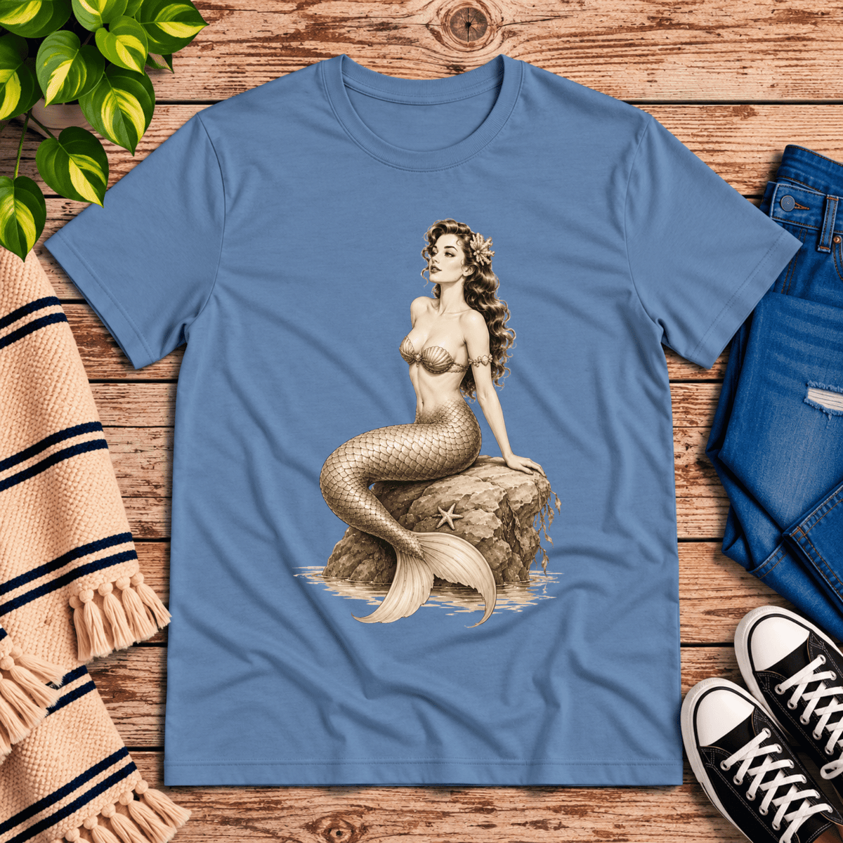 Beach Mermaid pinup graphic t-shirt cozy flat lay in steel blue.