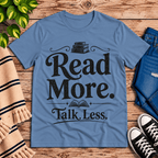 Talk Less funny book graphic t-shirt cozy flat lay in steel blue.