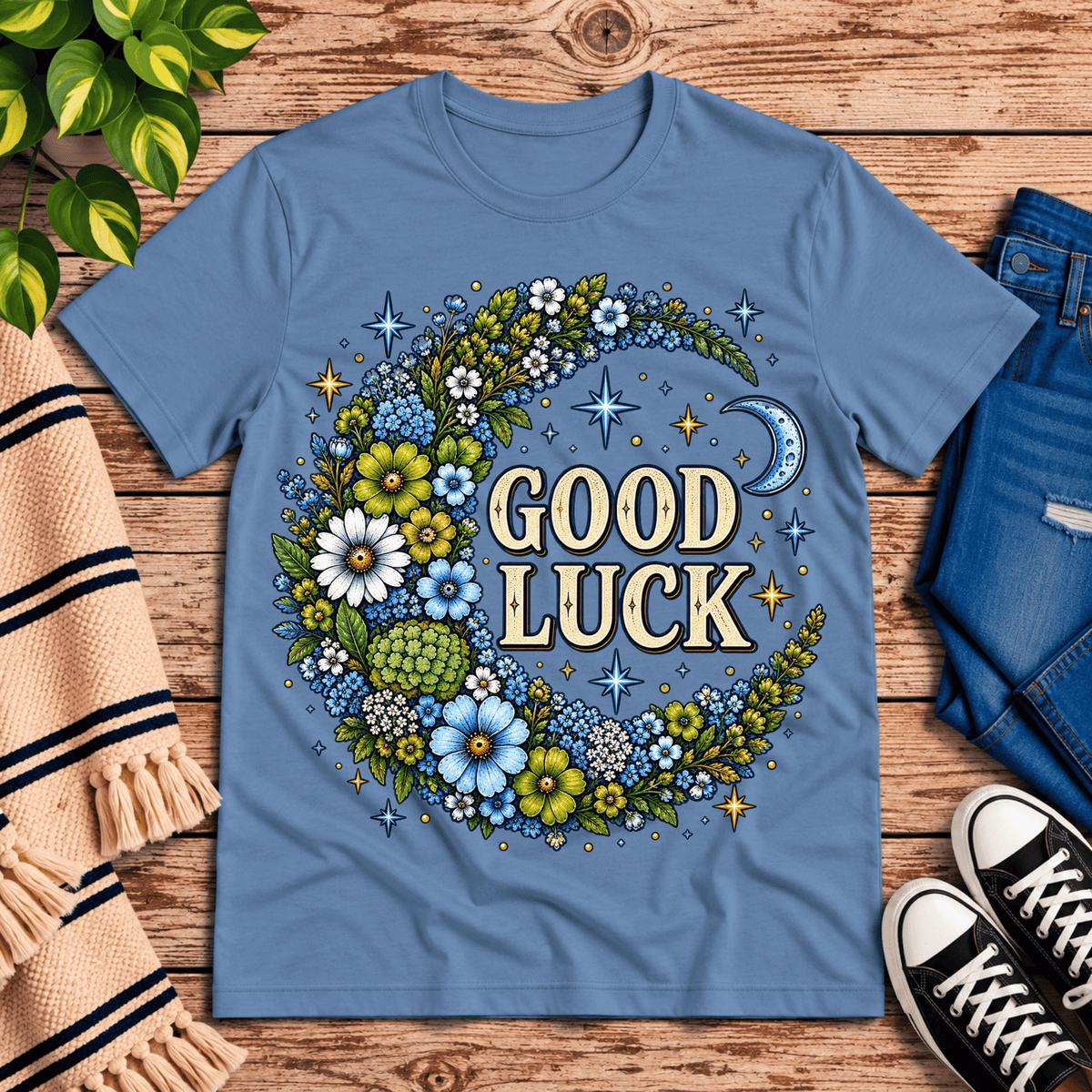 Good Luck In Blue cute celestial graphic t-shirt cozy flat lay in steel blue.