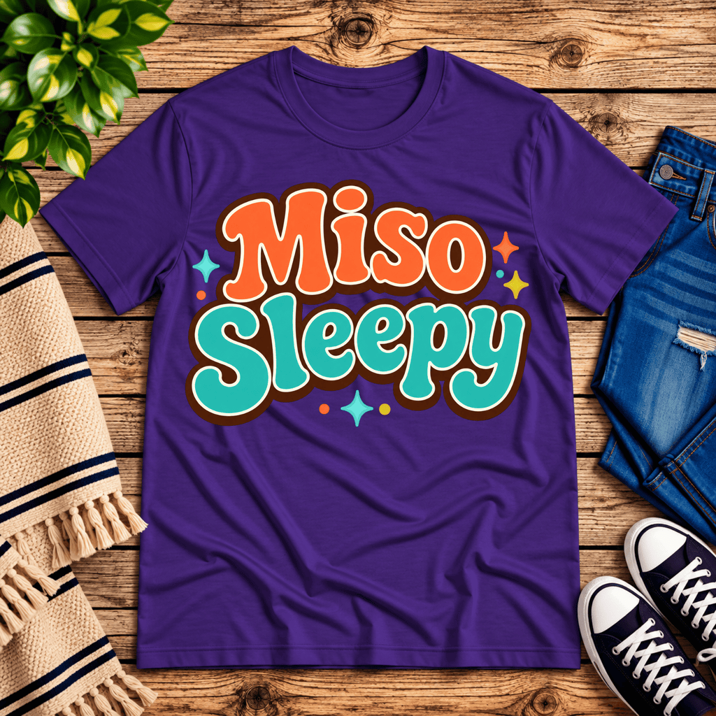 Miso Sleepy funny food graphic t-shirt cozy flat lay in team purple.