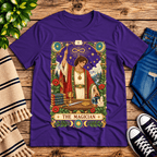 The Magician tarot card graphic t-shirt cozy flat lay in team purple.
