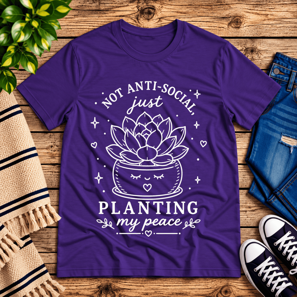 Planting My Peace cute plant graphic t-shirt cozy flat lay in team purple.