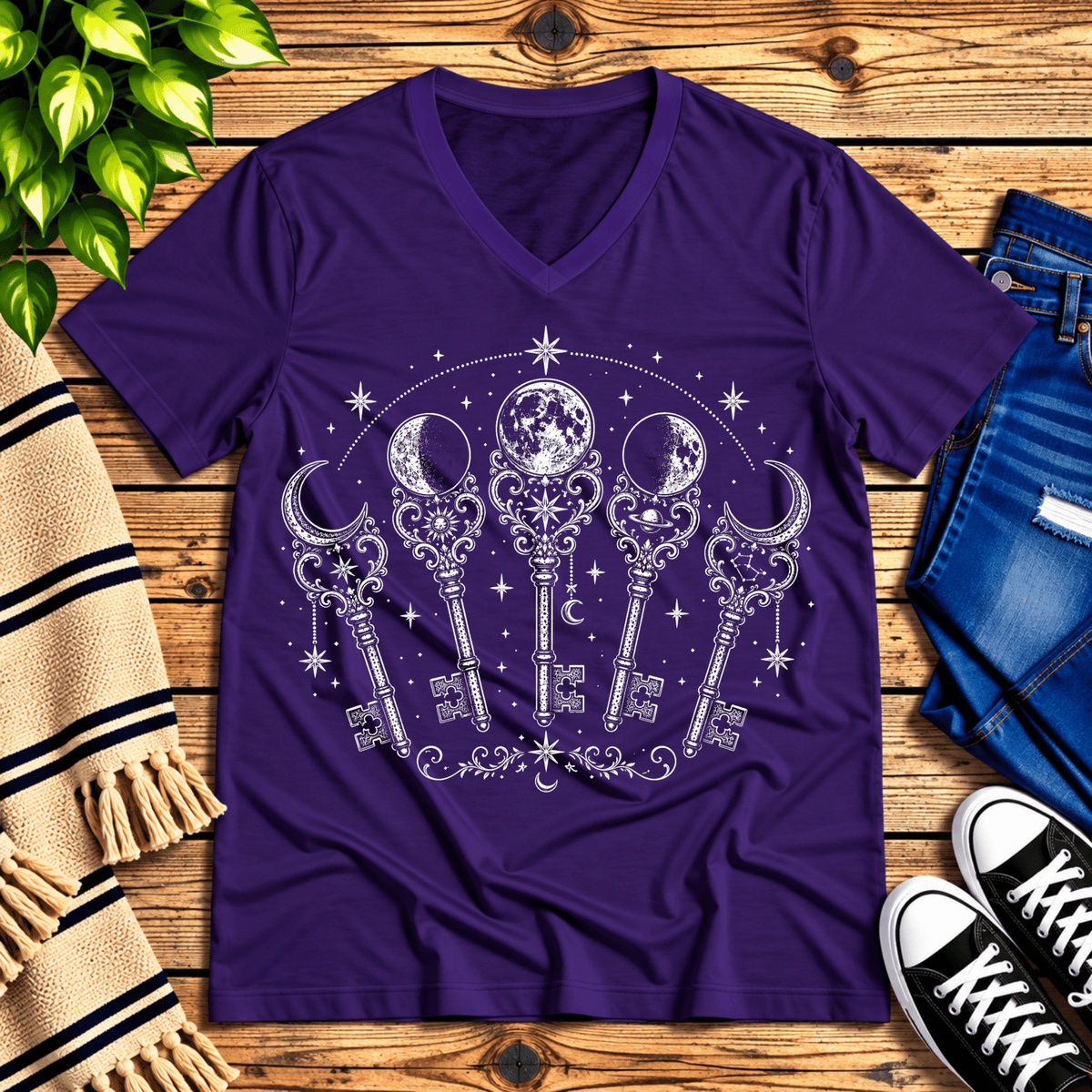 Moon Phase Keys celestial v-neck graphic t-shirt cozy flat lay in team purple.