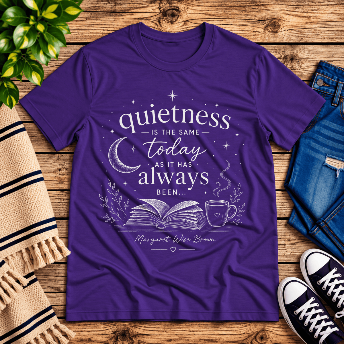 Quietness Today book quote graphic t-shirt cozy flat lay in team purple.
