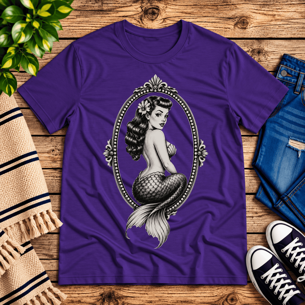 Mermaid Cameo vintage pinup graphic t-shirt cozy flat lay in team purple.