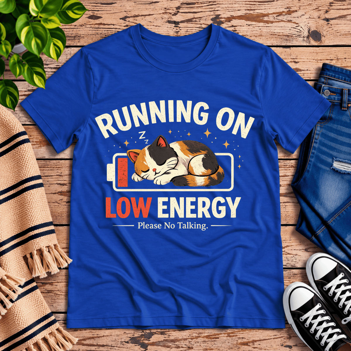 Low Energy Cat cute animal graphic t-shirt cozy flat lay in true royal.