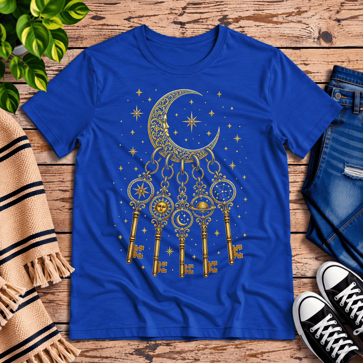 Cosmic Keyring whimsical celestial graphic t-shirt cozy flat lay in true royal.