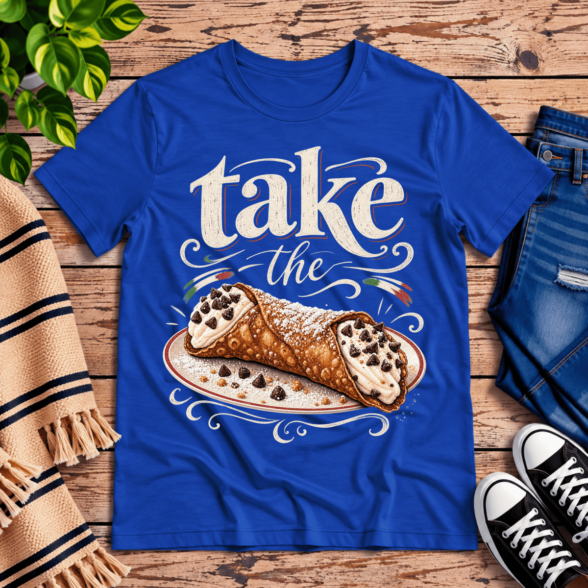 Cannoli cute food graphic t-shirt cozy flat lay in true royal.