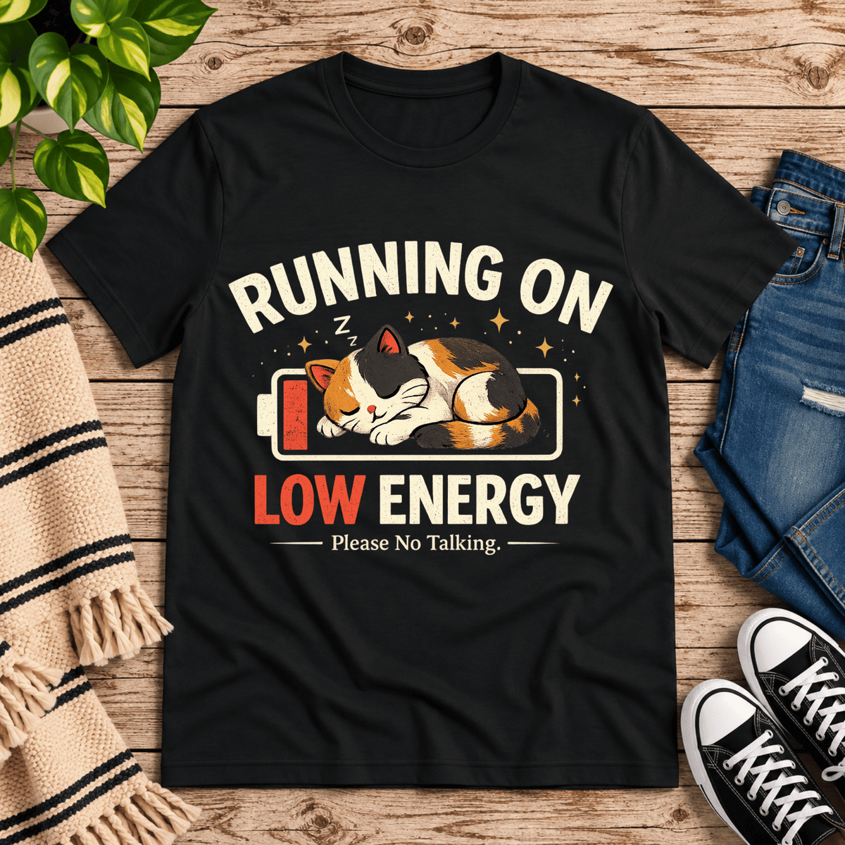 Low Energy Cat cute animal graphic t-shirt cozy flat lay in vintage black.