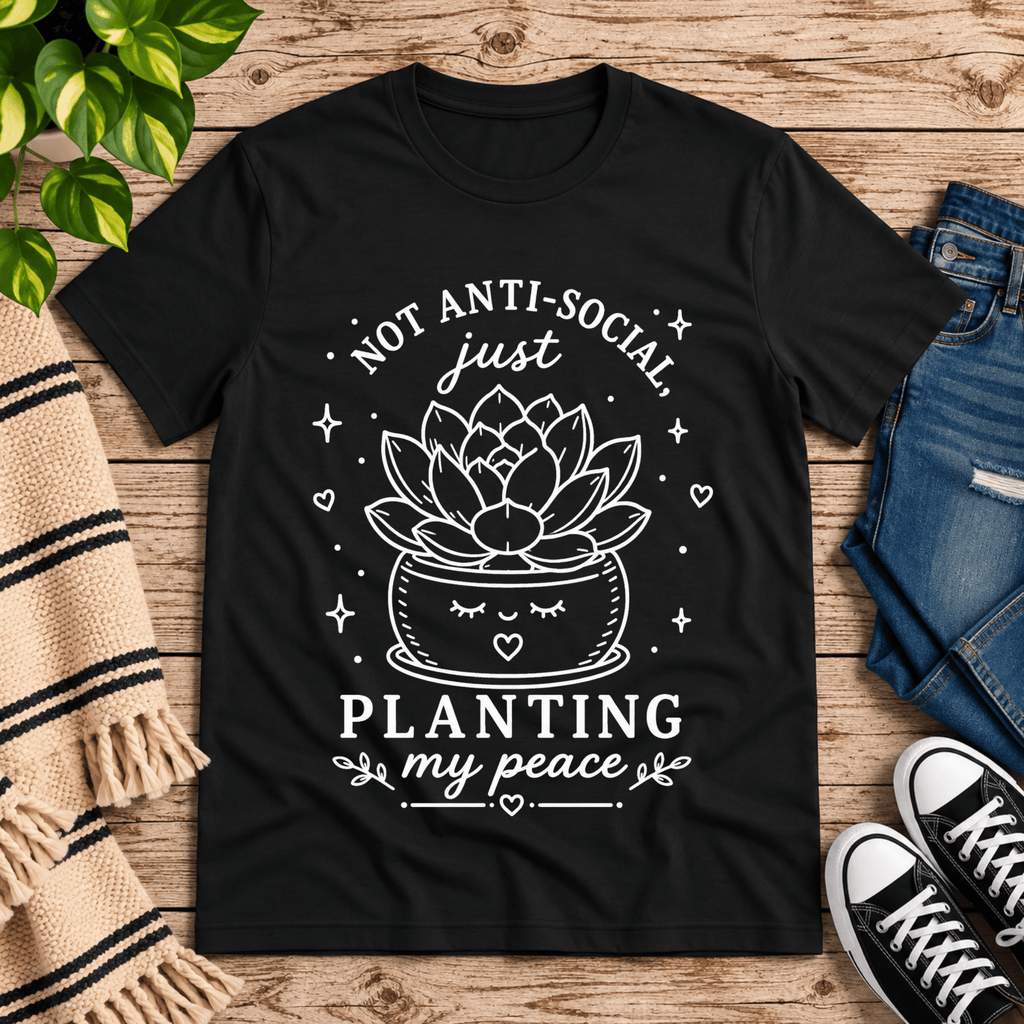 Planting My Peace cute plant graphic t-shirt cozy flat lay in vintage black.