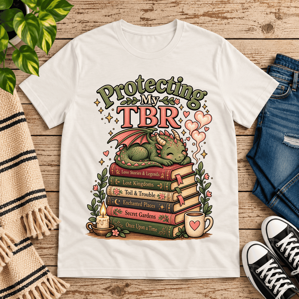 Protecting My TBR cute book graphic t-shirt cozy flat lay in vintage white.