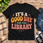It's A Good Day book lovers graphic t-shirt cozy flat lay in vintage black.