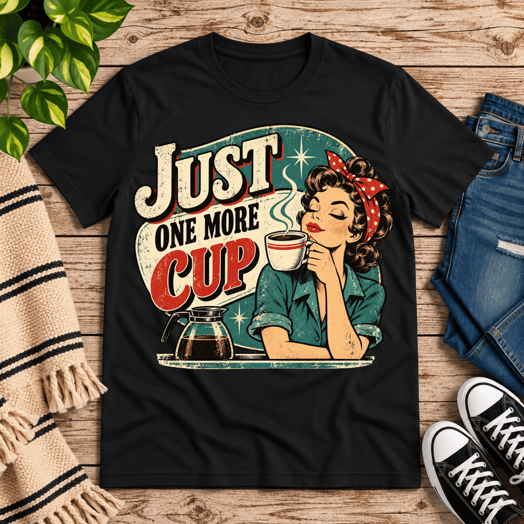 Just One More retro coffee graphic t-shirt cozy flat lay in vintage black.