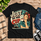 Just One More retro coffee graphic t-shirt cozy flat lay in vintage black.