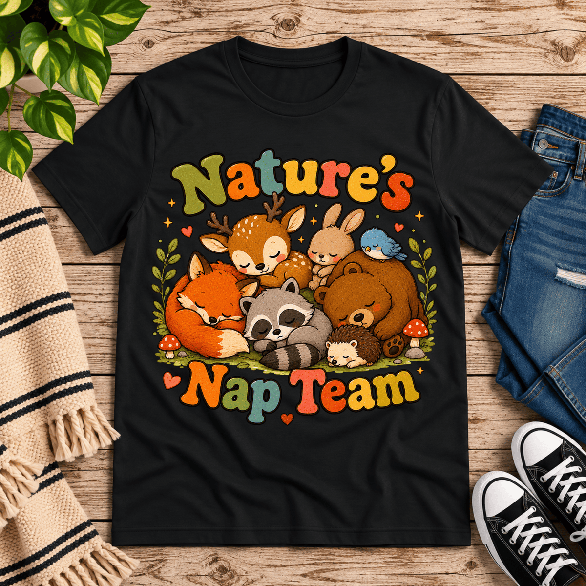 Nature's Nap Team cute animal graphic t-shirt cozy flat lay in vintage  black.
