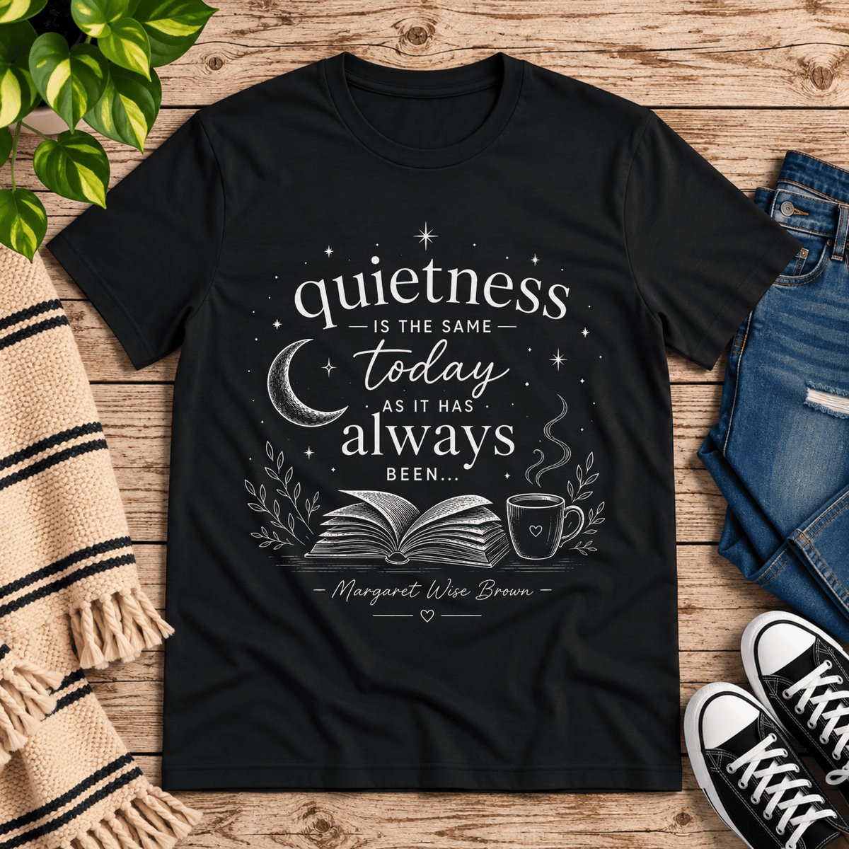 Quietness Today book quote graphic t-shirt cozy flat lay in vintage black.