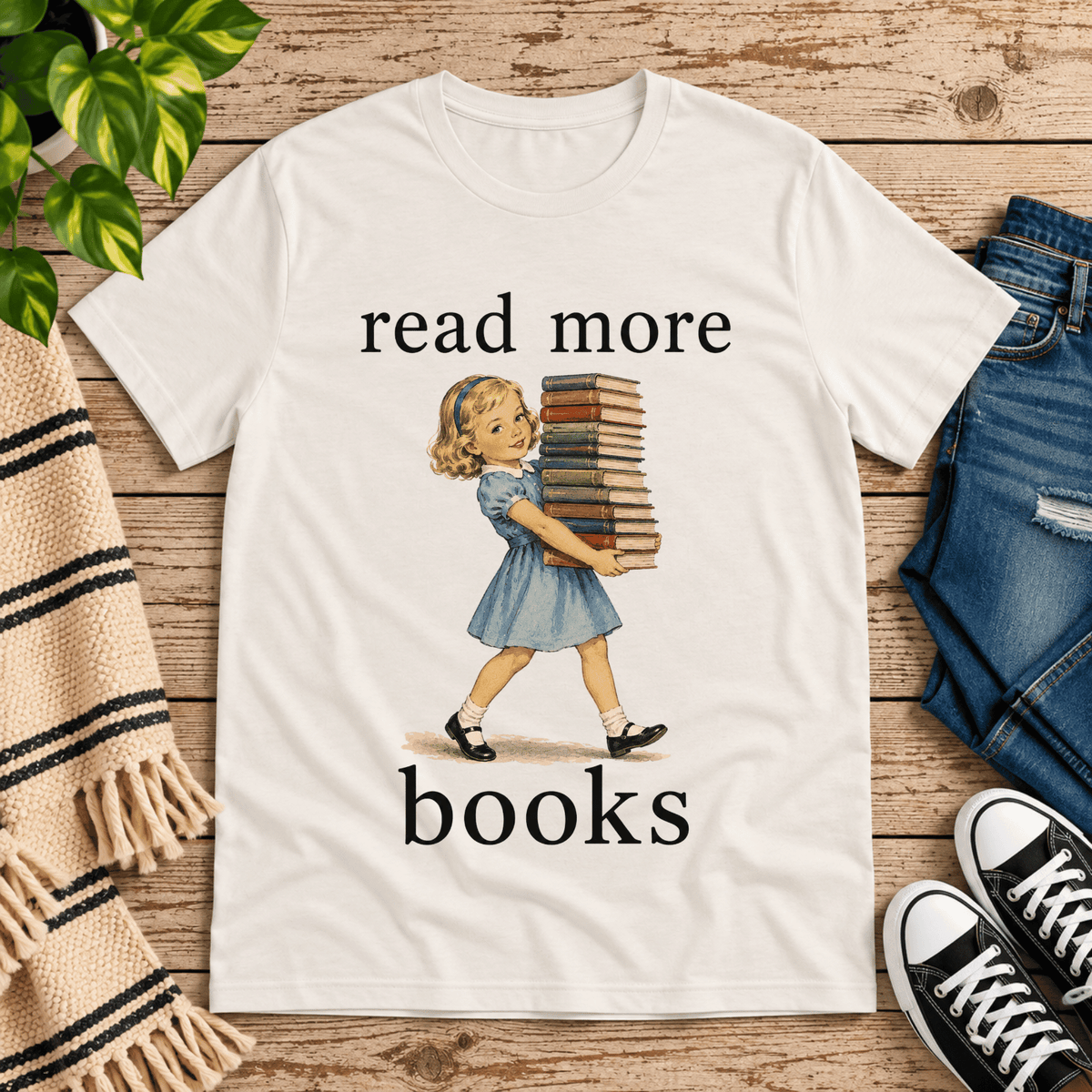 Read More vintage book graphic t-shirt cozy flat lay in vintage white.