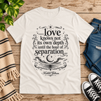 Love Knows Not book quote graphic t-shirt cozy flat lay in vintage white.