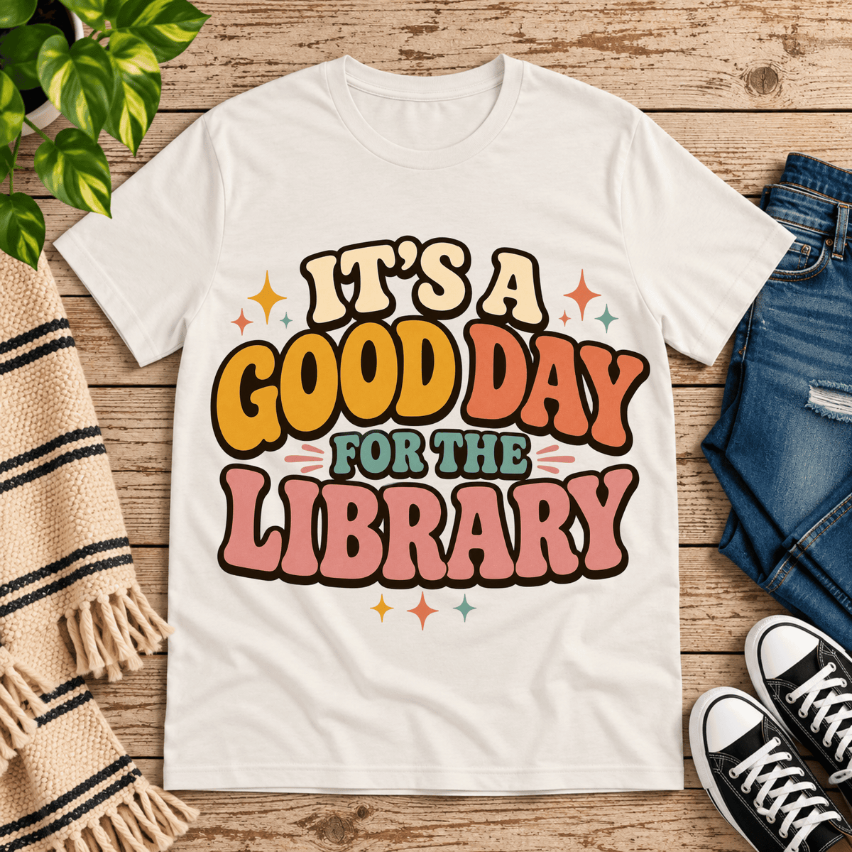 It's A Good Day book lovers graphic t-shirt cozy flat lay in natural.
