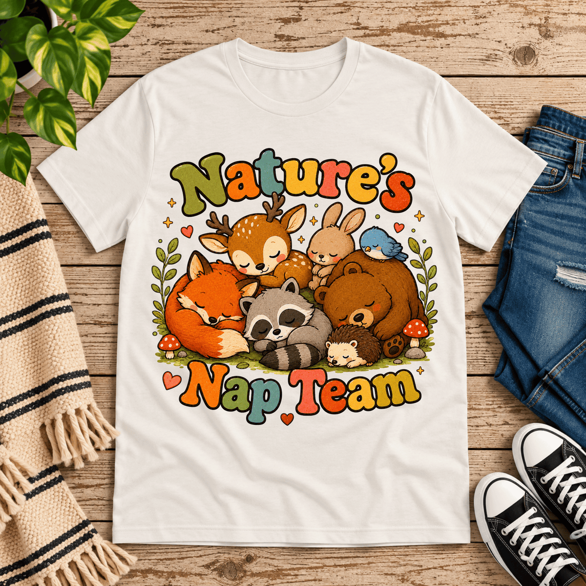 Nature's Nap Team cute animal graphic t-shirt cozy flat lay in vintage white.