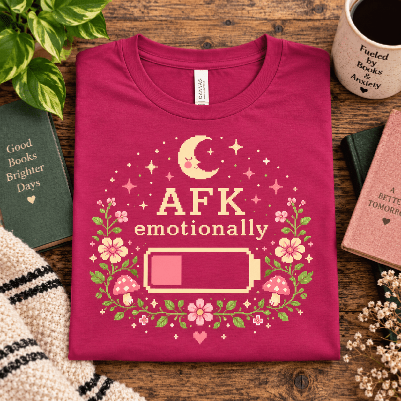 AFK Premium T-Shirt in berry pink, folded close-up styled with books and a mug
