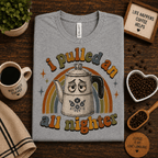 All Nighter Premium T-Shirt in heather gray, folded close-up styled with coffee beans