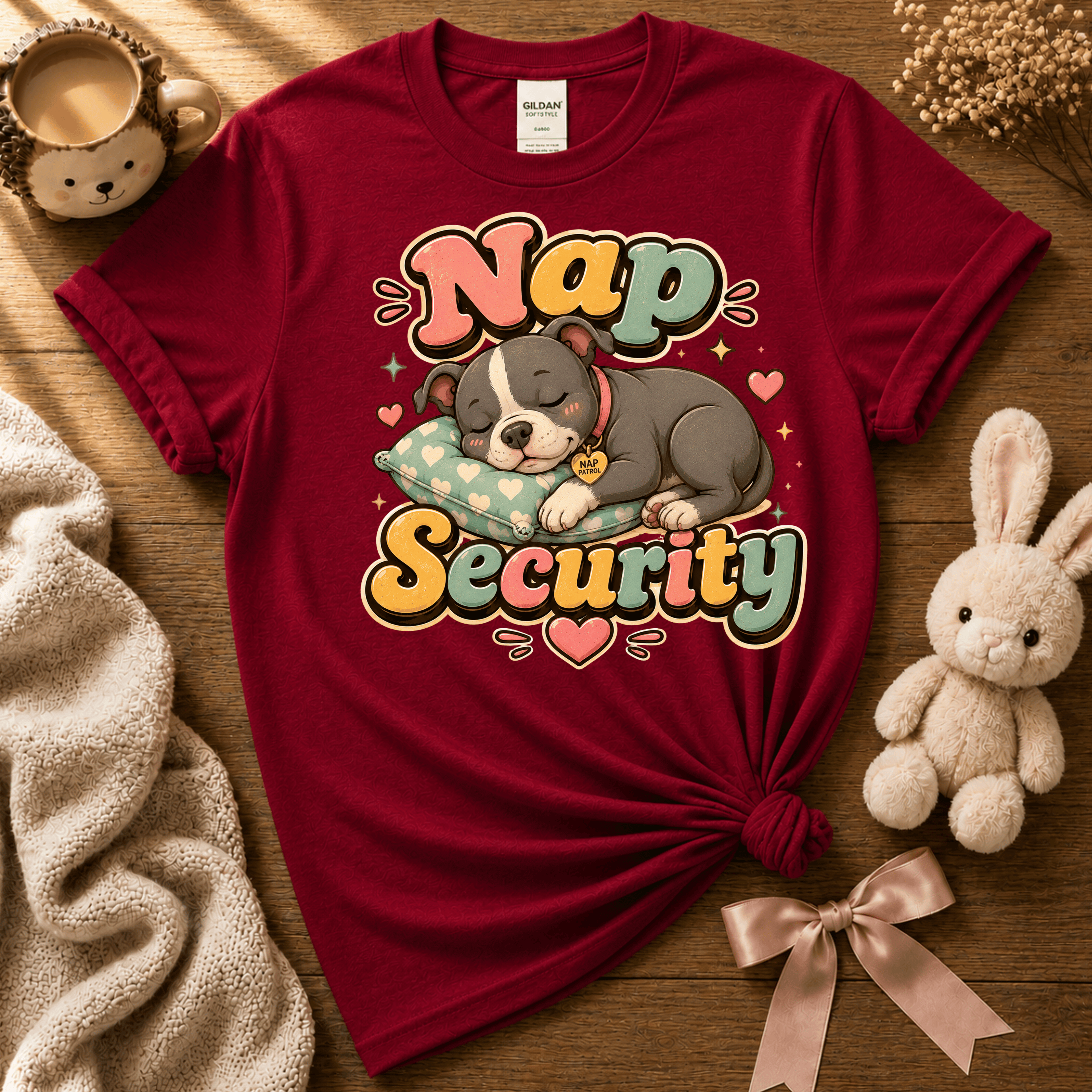 Nap Security cute animal graphic t-shirt displayed in a cozy flat lay in antique cherry red.